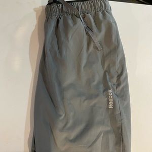 REEBOK splash pants